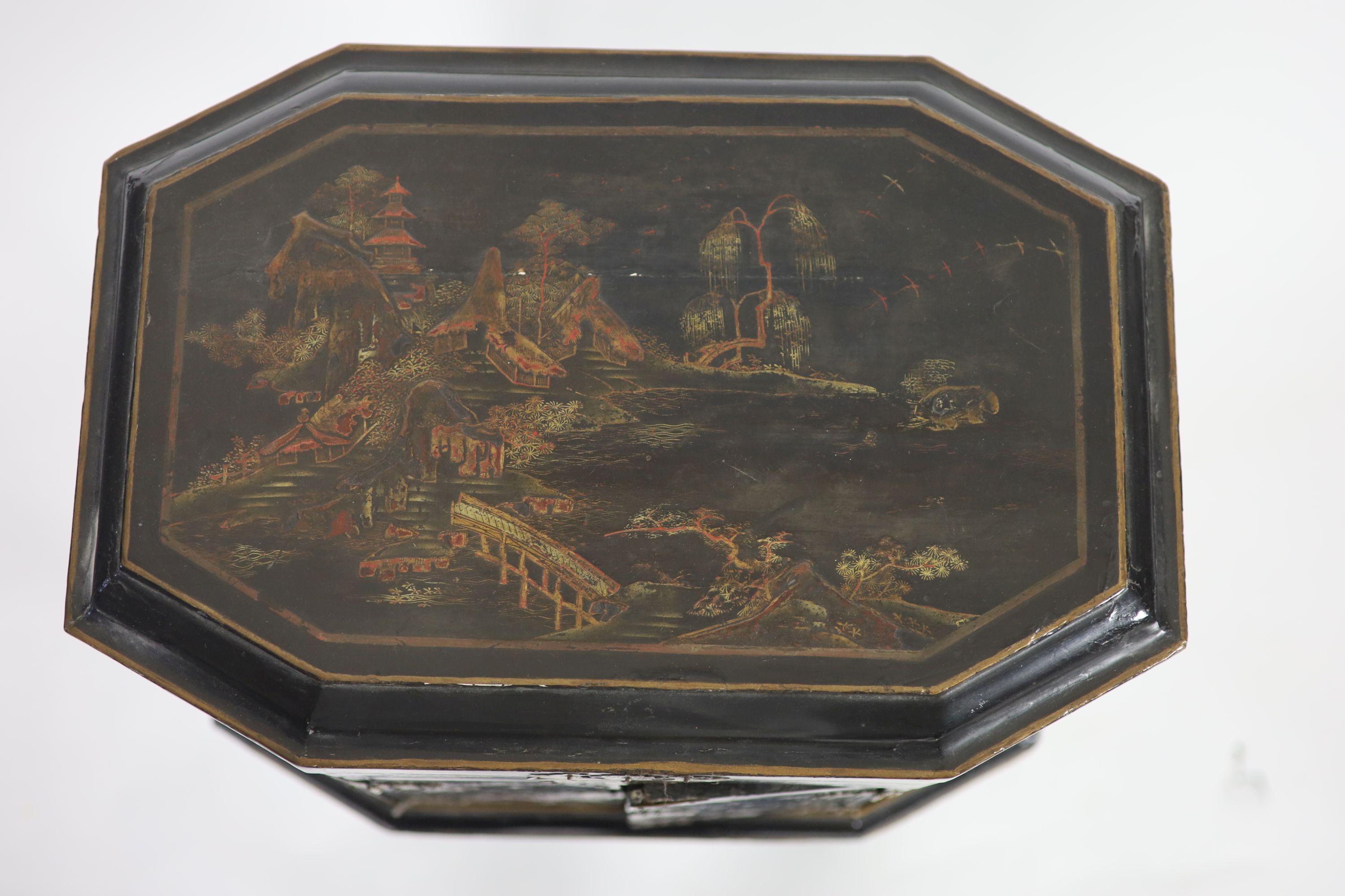 An 18th century Japanese black lacquered table cabinet on stand H 123cm. W 56cm. D 38cm.